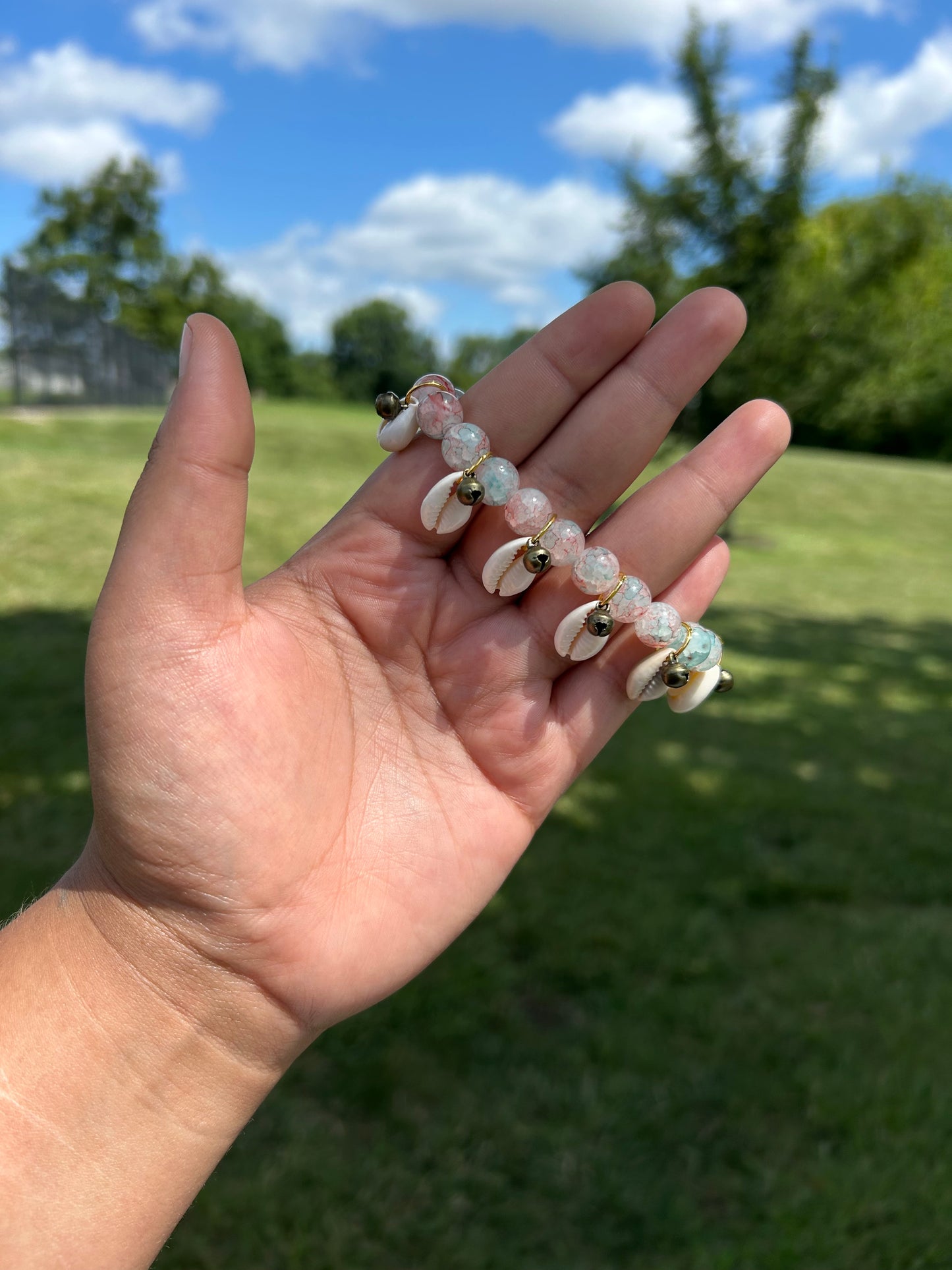 Copped Bells And Cowrie Shells Glass Bracelet